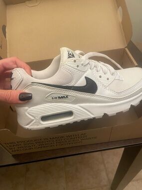 Nike Women's White Sneakers with Black Swoosh